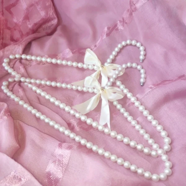 6 pieces Pearl Baby Hangers Little Luxe Pearl Hangers Baby Pearl Charm Hangers Elegant Baby Pearl Hanger Mini Pearl Hangers for Babies Tiny Treasures Pearl Hangers Baby Bliss Pearl Hangers Handmade Baby Pearl Hangers